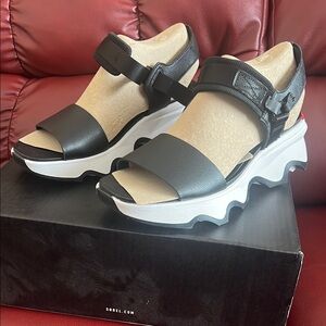 Sorel Black and White Platform Sandals